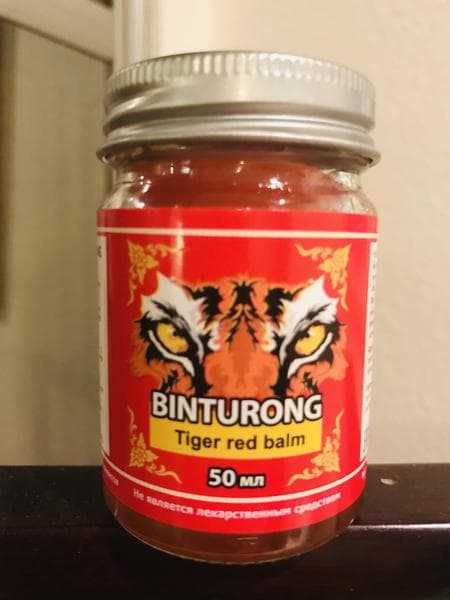 Бальзам Binturong Красный Тигр — фото из отзыва «Если продуло и что-то болит, тигр красный на помощь спешит.» (1 из 2)