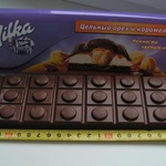 Шоколадка Milka с цельным орехом и карамелью фото 1 