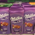 Шоколад Milka молочный фундук-изюм 100г фото 1 